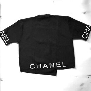 Asymmetric design black knit top